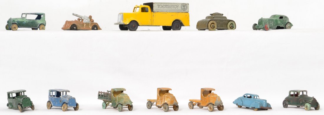 Group of early slush and Tootsietoy vehicles: Neat group with early slush cars and trucks, a few lead soldiers and several Tootsietoy vehicles. A neat lot with well over 20 items although some will need to be repainted, the majority is in nicer s