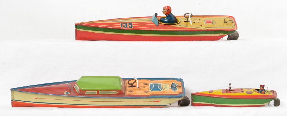 Three Lindstrom tin lithographed wind up boats: Three Lindstrom tin wind up boats in very nice shape. The two larger boats wind up and run nicely but the smaller one has issues with the clockwork mechanism and needs repaired for it to work. The two