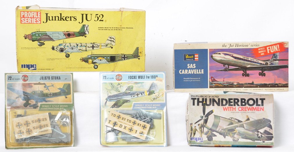 Group of vintage plastic model kits in boxes: Five vintage plastic model kits, all unbuilt in original packaging including: 1964 Revell SAS Caravelle, Airfix 1/72 Focke Wulf Fw 190D & Ju.87B Stuka and MPC Republic P-47D Thunderbolt & Junkers JU 5
