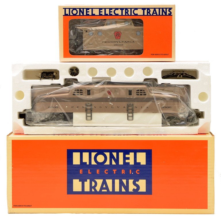 Lionel PRR 18300 Loco 19702 Caboose MINT OB: Lionel 18300 Mint Car Series Pennsylvania GG-1 electric diesel loco and a 19702 Pennsylvania porthole caboose both in OBs, factory new C10.