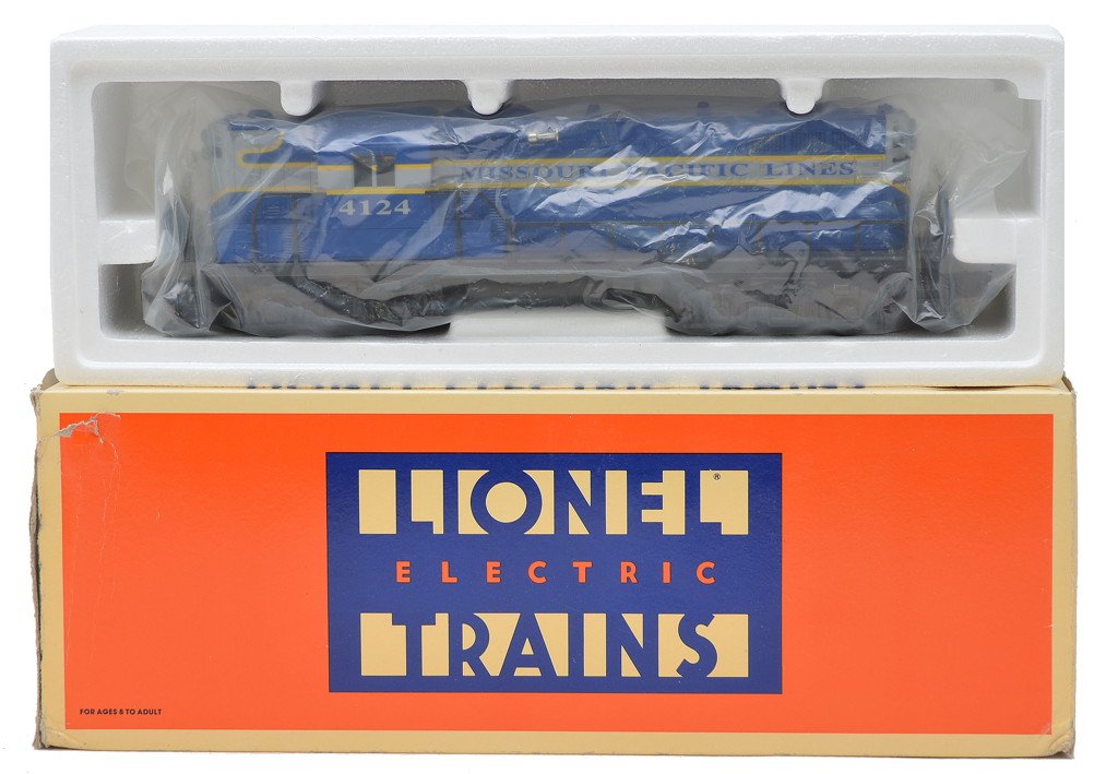 Lionel 18514 Missouri Pacific GP-7 Diesel MINT OB: Lionel 18514 Missouri Pacific GP-7 diesel in OB, circa 1995. The loco has been test run, C9. The OB has some damage to it.