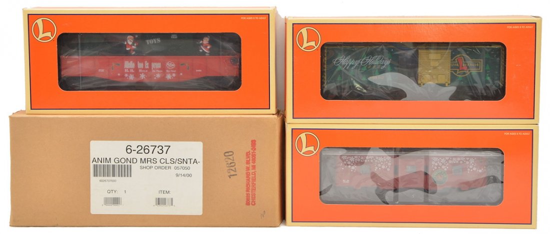 Lionel 1998 Christmas Cars 16291 19750 26737 MIB: Lionel 1998 Christmas cars including; 16291 boxcar,19750 Holiday music bay window caboose and 26737 Mr. & Mrs. Claus animated gondola. All cars are in OBs and the gondola has an outer shipping carton.