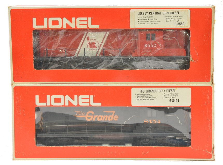 Lionel 8550 Jersey Central 8454 D&RGW Diesel OB: Lionel 8550 Jersey Central GP-9 diesel and 8454 Denver & Rio Grande GP-7 diesel in OBs, C8. The 8550 OB has moisture damage.