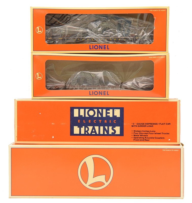 Lionel Freight Cars 51600 6509 16946 16983 OBs: Lionel freight cars in OBs including; 51600 NYC depressed center flatcar with generator stator load, 6509 depressed flatcar with girder load, 16946 Chesapeake & Ohio F9 3840 well car and 16983 Pennsyl