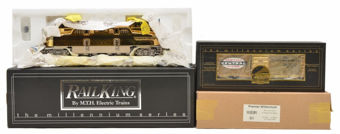 RK MTH Millennium Series 30-2514-0 20-93037: Rail King by MTH Millennium Series 30-2514-0 gold-plated Pennsylvania GG1 electric loco in OB. Also included is a Millennium Series 20-93037 gold-plated New York Central 40 ft. single door boxcar in O