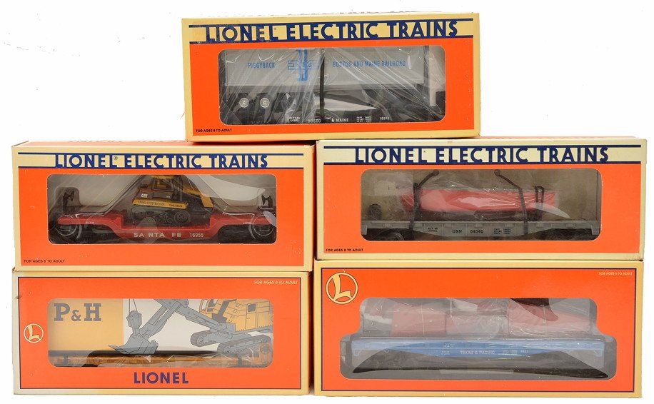 Lionel 16911 16939 16955 16978 17516 MINT OB: Lionel flatcars with loads in OBs including; 16911 Boston & Maine with trailer, 16939 United States Navy with boat, 16955 AT&SF with Ertl Challenger, 16978 Milwaukee Road 6464 with P&H power shovel mo