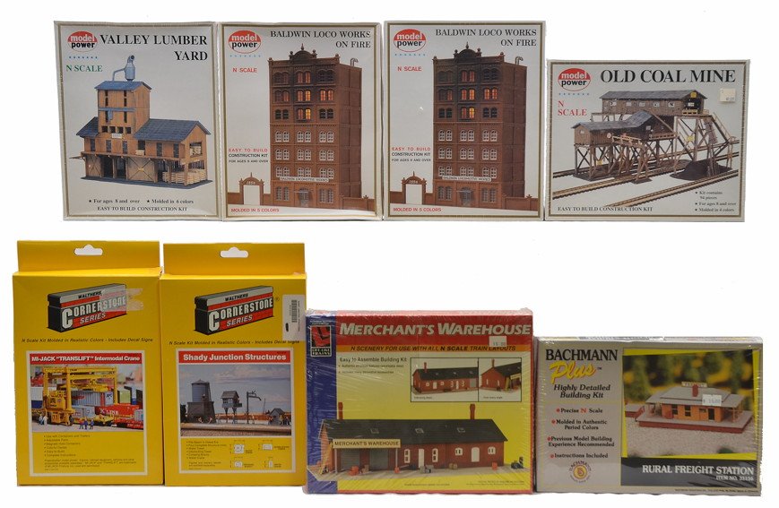 Selection of N Ga. Building Kits Model Power: Selection of N gauge building kits including; Model Power two 1525 Baldwin Loco Works on fire, 1552 Old Coal Mine and 1565 Valley Lumber Yard factory sealed in OBs, Life-Like Trains 7444 Merchants War