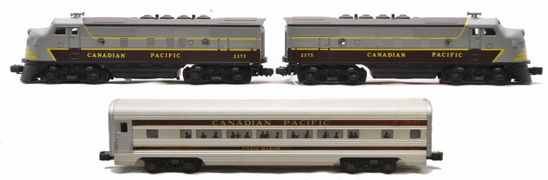 Lionel 2373 CP F3 AA 2544 Craig Manor Pass Car: Lionel postwar 2373 Canadian Pacific F3 AA diesel units. Both of the chassis on the units have been restored and the cabs are reproduction. Units look like new. Also included is a Pennsylvania aluminu