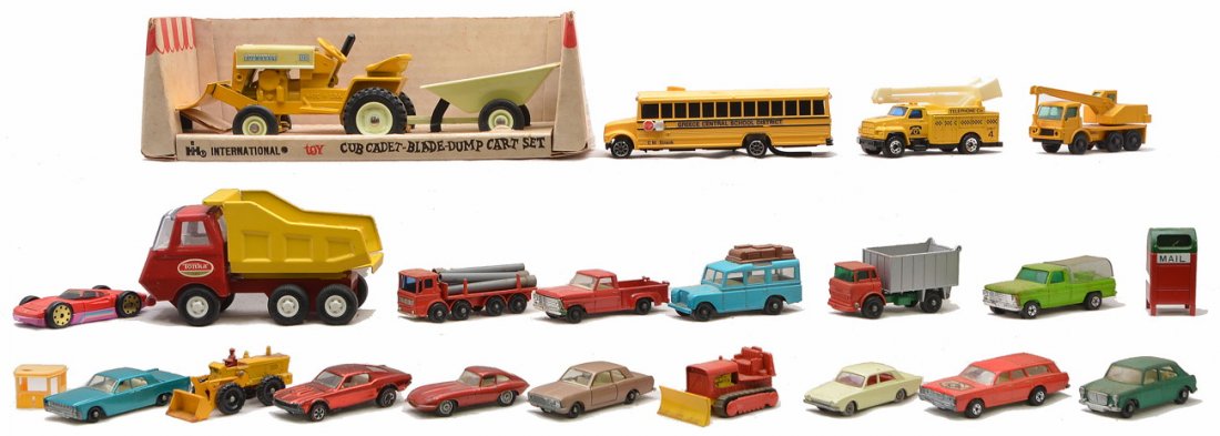 Ertl Cub Cadet No. 433 in OB Tonka Matchbox: Ertl International Cub Cadet set No. 433 in OB, Tonka dump truck and also included is a selection of die-cast and plastic vehicles including; Matchbox and Lesney. Please view photo to verify selection