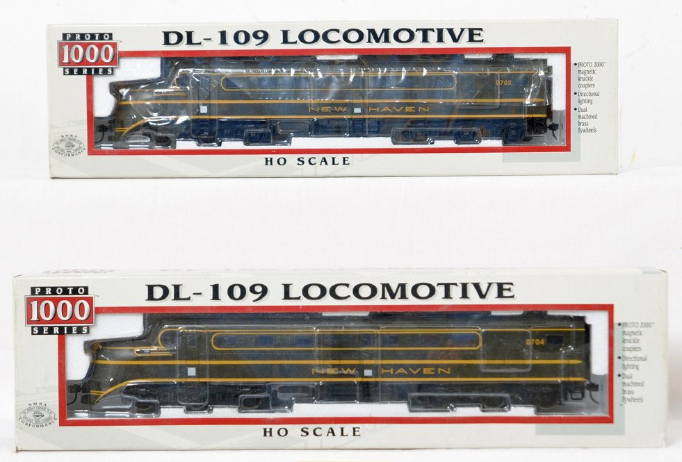 Proto 1000 New Haven DL-109 A-A set: Proto 1000 modern HO New Haven DL-109 A-A pair in OBs. Both locos are powered. Catalog numbers are 30657 and 30574. Locos are new in the box C9-10 and feature Kadee couplers.