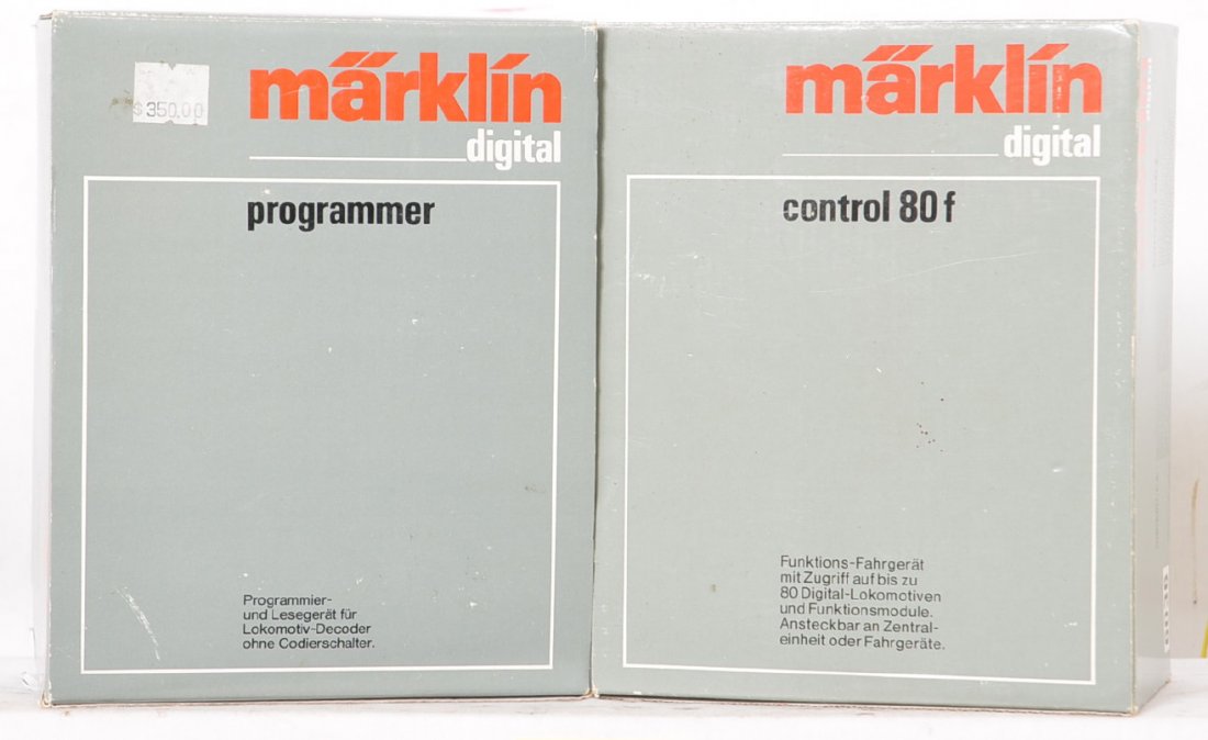 Marklin digital controller and programmer 6032 6036: Marklin modern HO digital controllers. Includes 6036 control 80 F and 6032 programmer. Items appear lightly used C8-9.