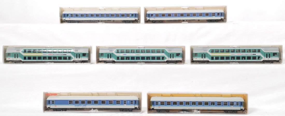 7 Fleischmann passenger cars 5177 5176, 5121, 5122, etc: Fleischmann HO passenger cars in OBs. Seven cars include two 97 5121, 96 5122, 5176, 77, 78, and 79. Cars are C8-9 condition with little if any run time.