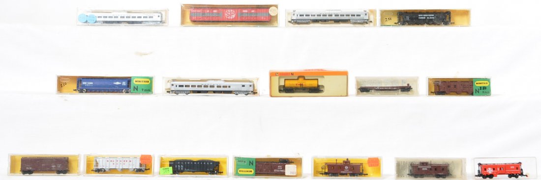 16 N scale RDC and freight cars Atlas, Mini Trix, etc: Atlas, Con Cor, and Mini Trix and Arnold modern N scale items. 3 Con Cor Santa Fe RDC cars, one powered two dummy, and 13 freight cars. Items C7-8. See photos for best description.
