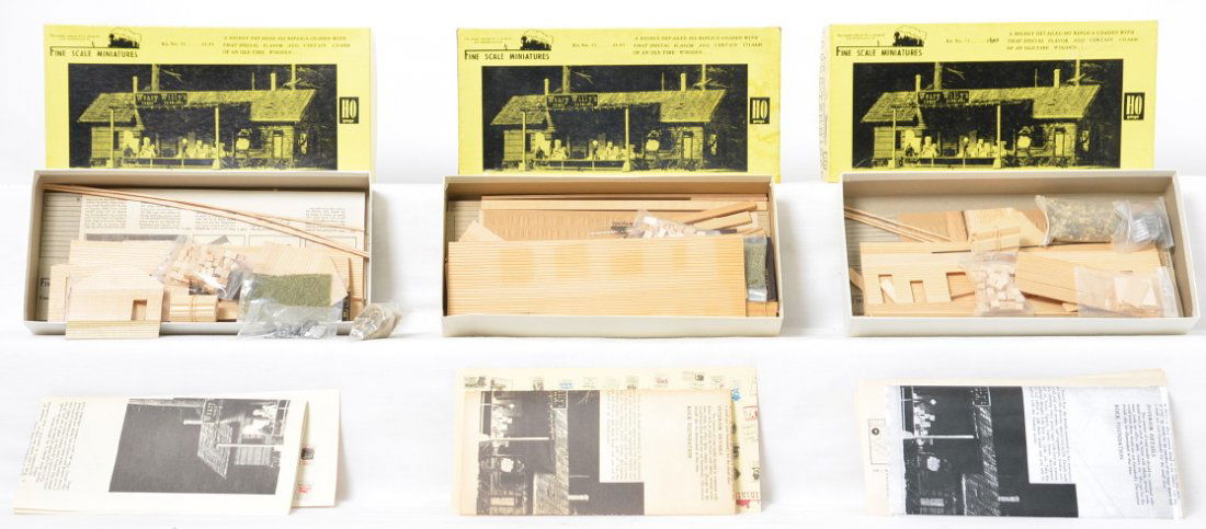 3 Fine Scale Miniatures Truck Terminal kits: Fine Scale Miniatures modern HO building kits in OB. Three number 55 Truck Terminal kits. Kits appear to be complete C9-10. OBs have light wear.