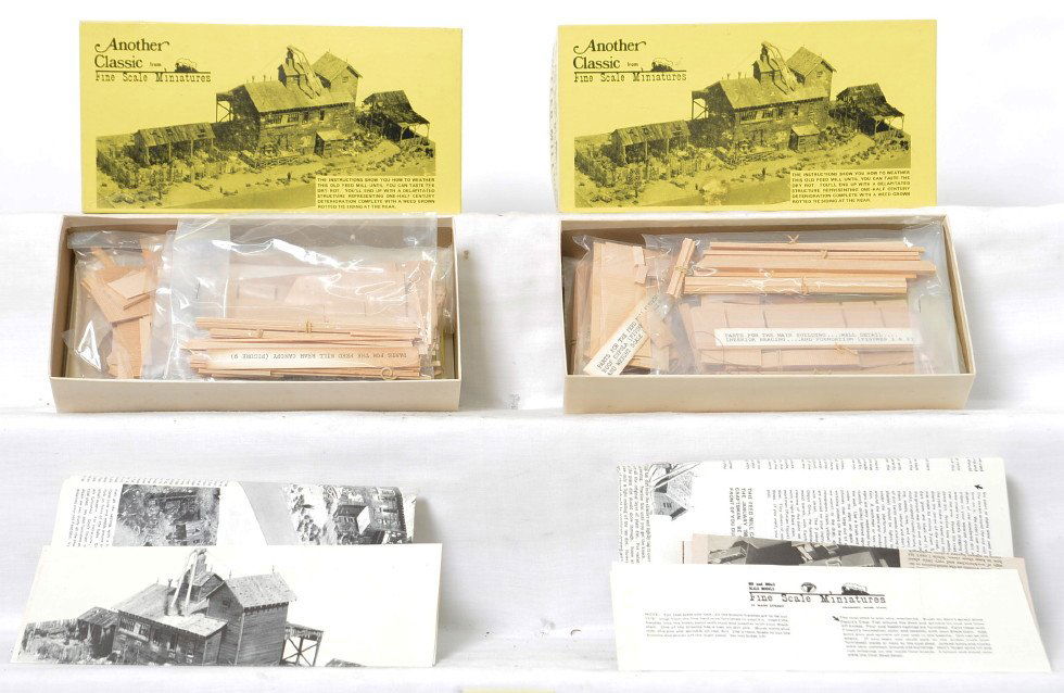 2 Fine Scale Miniatures 185 Feed Mill kits: Fine Scale Miniatures modern HO building kits in OBs. Number 185 Crocker Bros. Feed Mill. Two kits are C10 with sealed bags and metal parts.