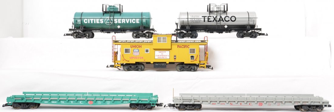 5 LGB and USA Trains freight cars UP, NYC, etc: LGB and USA Trains modern G scale freight cars. Five cars include 102375 and 101064 New York Central flat cars, 2545 Cities Service tank car, 9361 Texaco tank car, and 23736 Union Pacific caboose. Car