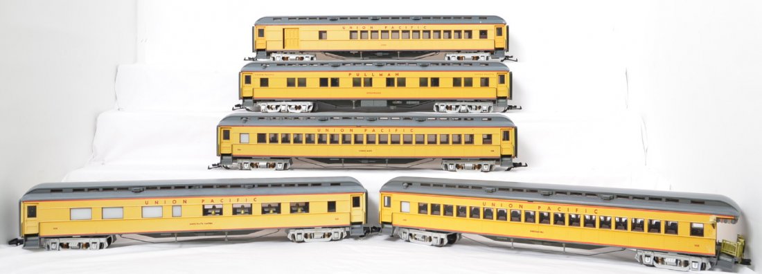 5 Aristo Craft Union Pacific heavyweight passenger cars: Aristo Craft modern G scale Union Pacific heavyweight passenger cars. Five cars include 31508 North Platte diner, 31308 Council Bluffs coach, 31808 Edgewood sleeper, 31708 2700 coach, and 31408 Sherma