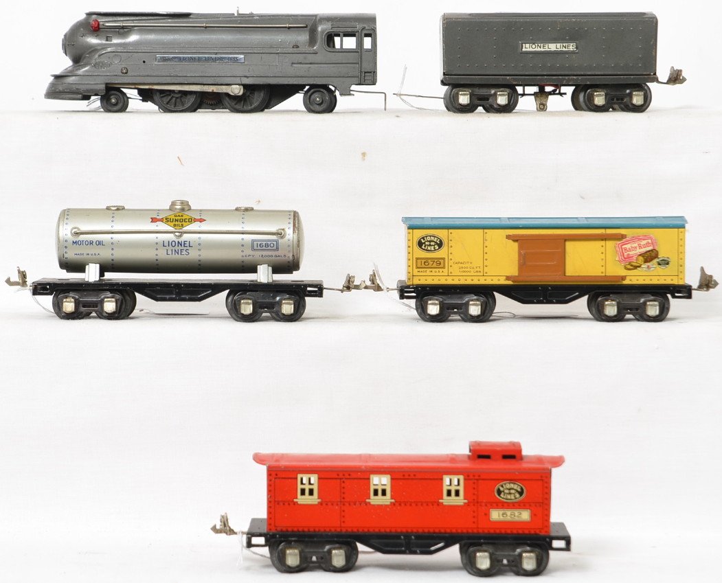 Lionel prewar O gauge 1073W set 1688 1689W 1679 1680: Lionel prewar O gauge 1073W freight set consisting of a 1688 bullet with 1689W tender in gunmetal, 1679 Baby Ruth boxcar, 1680 Sunoco tank car, and 1682 caboose, C6-7.