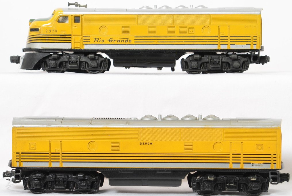 Lionel Postwar O gauge 2379 Rio Grande F3 AB: Lionel Postwar O gauge 2379 Rio Grande F3 AB set, no screw cracks in B unit, heavily corroded frame from battery damage has been repainted and the nose decal has lifted a little from the shell, C6.