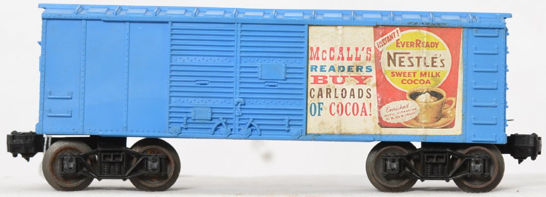 Lionel Postwar O gauge 6044-1X Nestle McCallÃ•s boxcar: Lionel Postwar O gauge 6044-1X Nestle McCallÃ•s boxcar, both miniature posters are firmly attached and were closely inspected and are original. Car is really nice and clean but the chassis could us