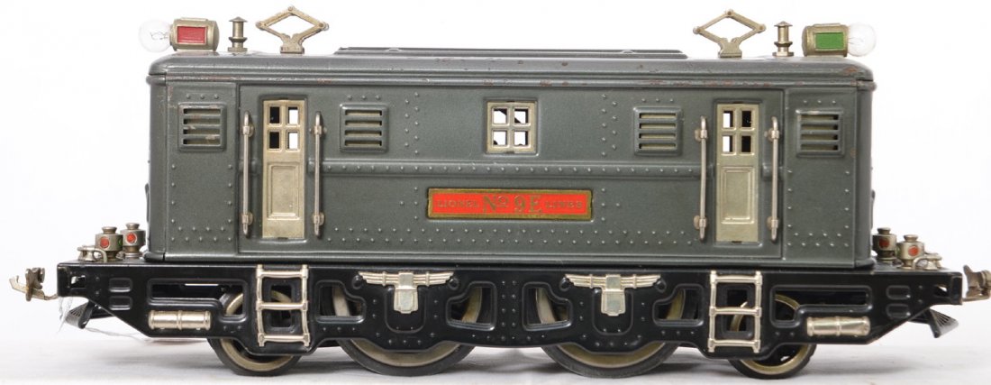 Lionel prewar 9E 2-4-2 electric locomotive gunmetal: Lionel prewar 9E 2-4-2 electric locomotive gunmetal. Plate on motor is marked Standard Locomotive, Lionel etc., Very nice shape and clean, C6+.
