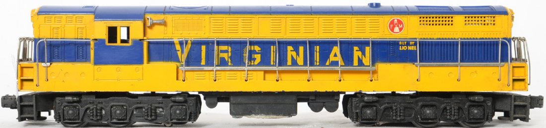 Lionel Postwar O gauge 2331 Virginian FM: Lionel Postwar O gauge 2331 Virginian FM with a blue molded body with yellow painted stripes, screw cracks on both ends with a small chunk missing from the rear and two incorrect screws, C6.