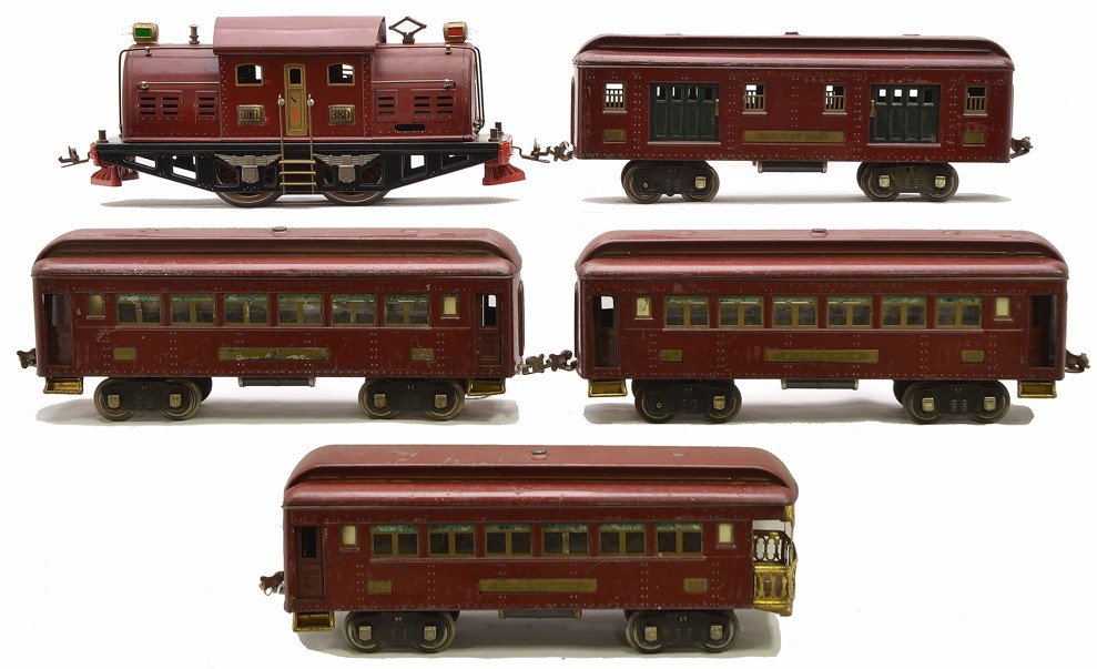 Lionel Std. Ga. Maroon Passenger Set no. 343E: Lionel prewar standard gauge maroon passenger set no. 343E including; 380E electric loco, 320 baggage with dark green doors, two 319 Pullmans and a 322 observation. The cars have Mojave inserts and ni