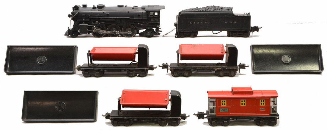 Lionel Prewar O Ga. Freight Set no. 151W: Lionel prewar O gauge freight set no. 151W, circa 1939 including; 225E black steam loco, 2235W tender, three 3659 remote dump cars with three 160 bins and a 2657 red caboose. The loco is C7-8. The res