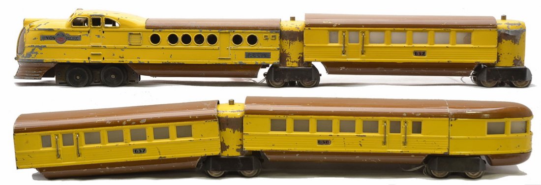 Lionel Yellow/Br. UP City of Denver Set no. 299W: Lionel prewar O gauge yellow and brown Union Pacific City of Denver streamlined passenger set no. 299W including; 636W power car, two 637 coaches and a 638 observation. Set is C5.