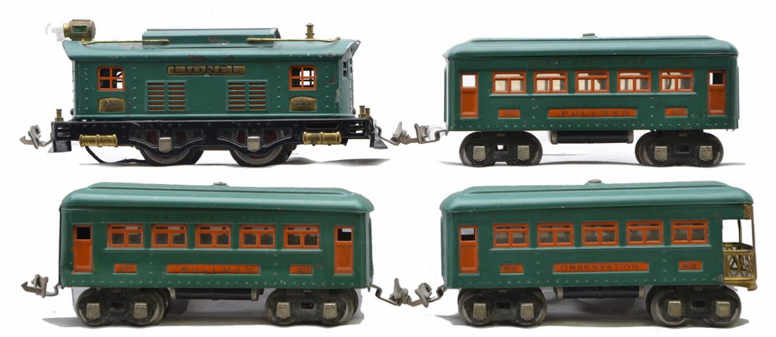 Lionel Prewar O Ga. Peacock Passenger Set 296: Lionel prewar O gauge peacock passenger set no. 296 including; 253 electric loco, two 607 Pullmans and a 608 observation. The set has orange inserts and nickel journals. The wheels on the loco are sta