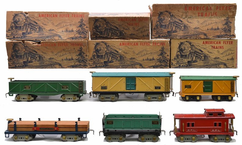 AF Freights 3207 3208 3216 3019 3017 3015: American Flyer prewar O gauge eight-wheel freight cars with gray trucks, brass trim and journals in worn OBs including; 3207 green sand car, 3208 Rookie Tan boxcar with turquoise roof, 3216 blue log c