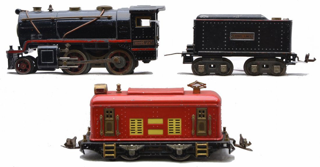 Lionel 258 Steam Loco 258T Tender 248 Loco: Lionel prewar O gauge 258 black steam loco with brass and copper trim and a 258T tender with brass trim and nickel journals, both with red striping. Striping has been redone. The loco has been partial