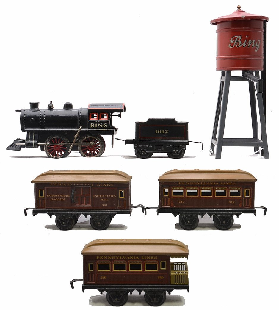 Bing Litho Pass Set Loco 1012 501 617 529: Bing prewar O gauge lithographed passenger set including; black cast iron clockwork 0-4-0 steam loco missing the headlight, 1012 four-wheel tender, 501 baggage, 617 coach and a 529 observation. The fo