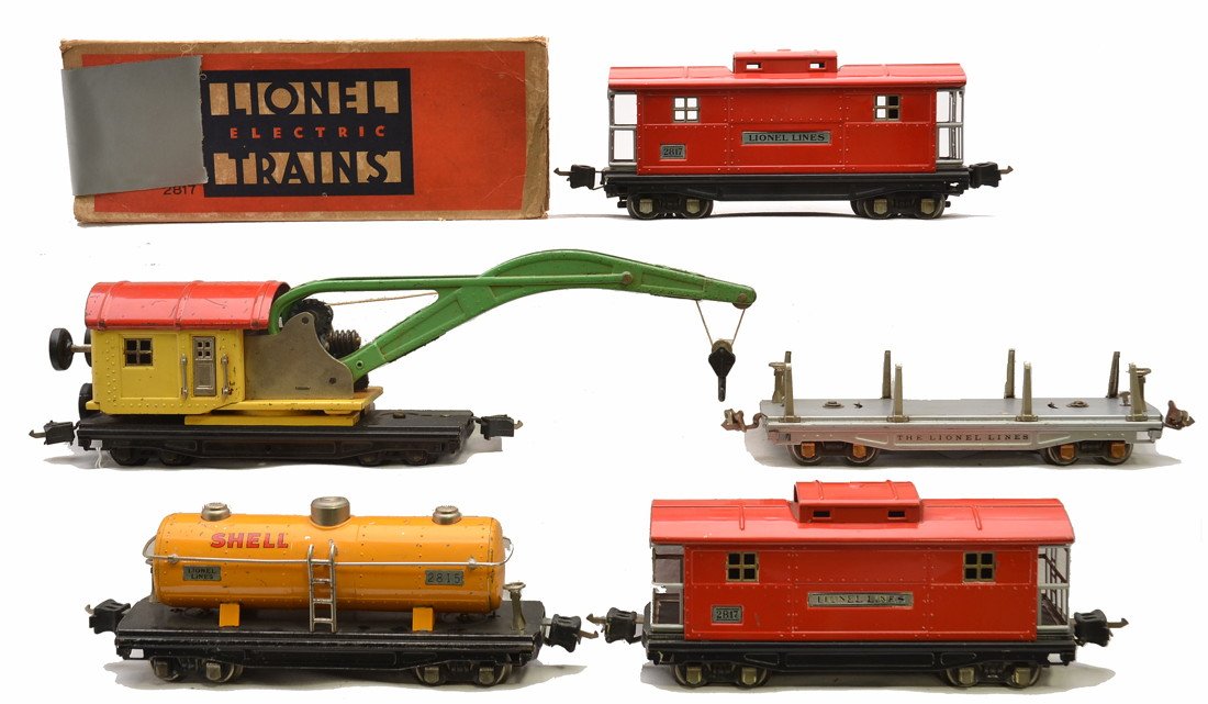 Lionel Freight Cars 2815 2817 2817 810 811: Lionel prewar O gauge 2815 orange Shell tank and two 2817 red cabooses one with a worn OB. The cars have nickel trim and journals. Also included is an 810 crane with cream cab, red roof, 45N green boo