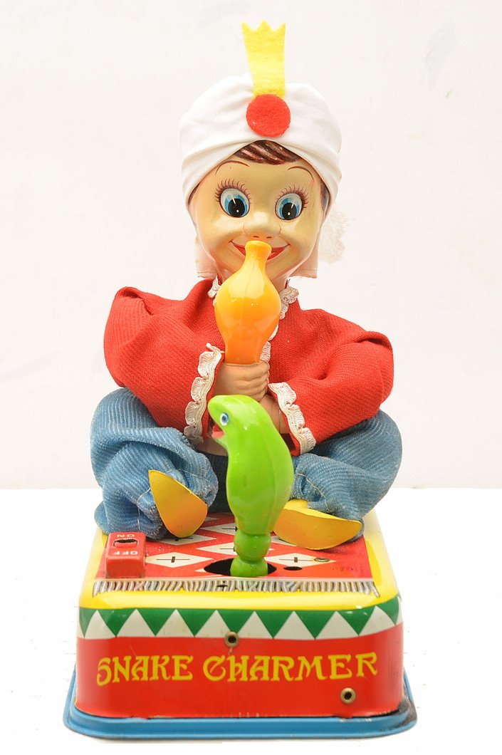 Marx Battery Oper. Tin Litho Snake Charmer: Marx battery operated tin lithographed Snake Charmer, C7-8.