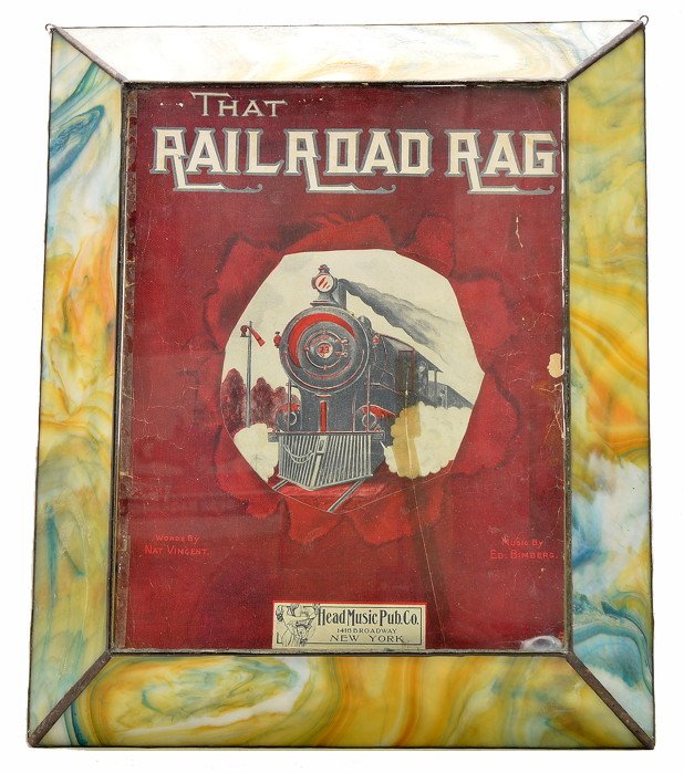 Sheet Music That Railroad Rag Tiffany Style Frame: Sheet music from Head Music Pub. Co. New York, circa 1911 with That Railroad Rag on the cover with a picture of a train. The sheet on the backside has The Ballad Success for the Season, Without You by