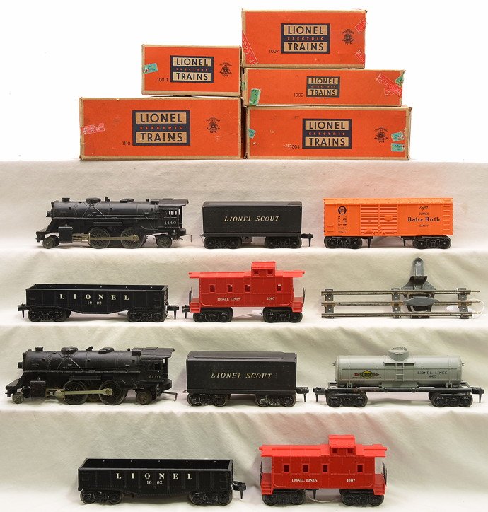 Lionel Scout Freight Sets 1119 OBs 1115: Lionel postwar Scout freight set no. 1119 all in worn individual OBs, circa 1951-52 including; 1110 steam loco, 1001T tender, 1002 black gondola, 1004 orange Baby Ruth PRR boxcar, 1007 red caboose and