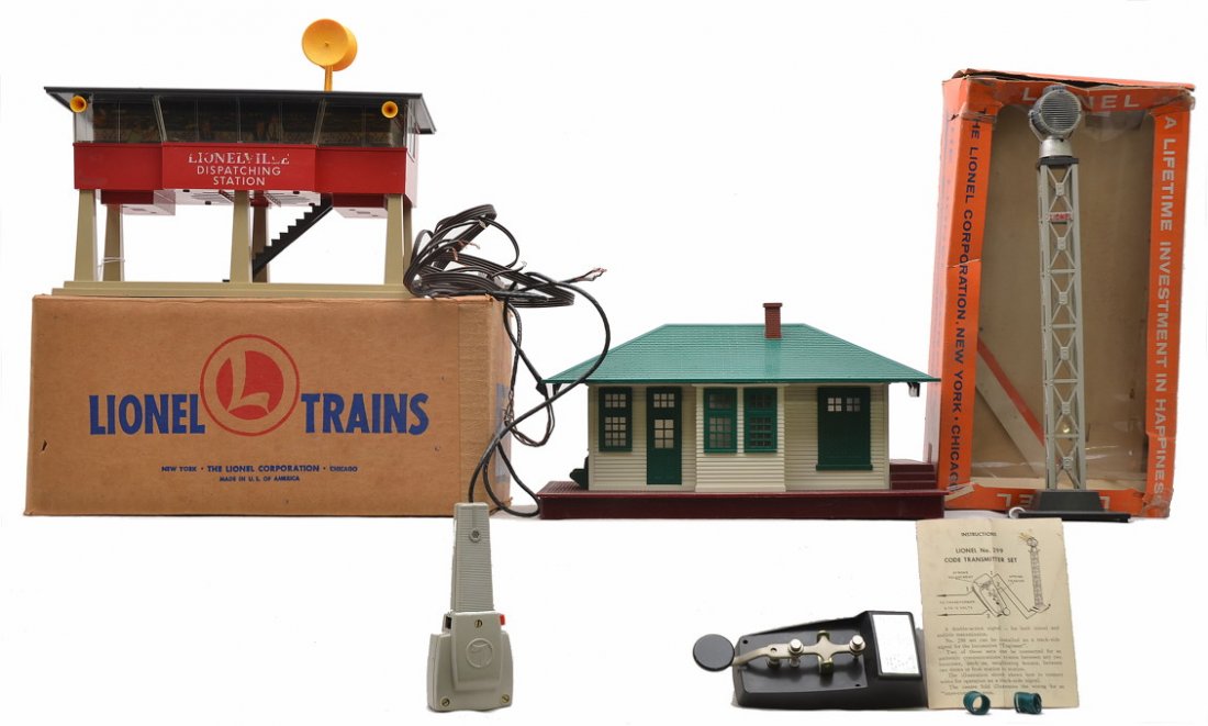 Lionel Postwar Accessories 299 465 Boxed 132: Lionel postwar accessories; 299 code transmitter set with instruction sheet, wires, tower and telegraph key in a worn and damaged OB, 132 station and a 465 sound dispatching station with microphone in