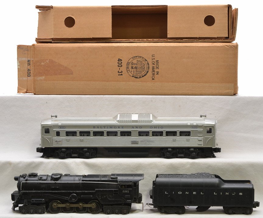 Lionel 400 B&O RDC-1 Budd Car 681 2046W: Lionel postwar 400 Baltimore and Ohio RDC-1 Budd car in OB with original cardboard insert, C6. Also included is a 681 black steam turbine loco with a 2046W tender. The steps on the loco are detached b