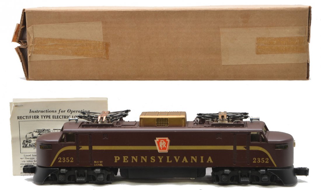 Lionel 2352 Tuscan PRR EP5 Electric Loco LN: Lionel postwar 2352 Tuscan Pennsylvania EP5 electric loco with a reproduction instruction sheet in a reproduction box. There is a crack on one end of the loco on the nose below the rivet, otherwise th