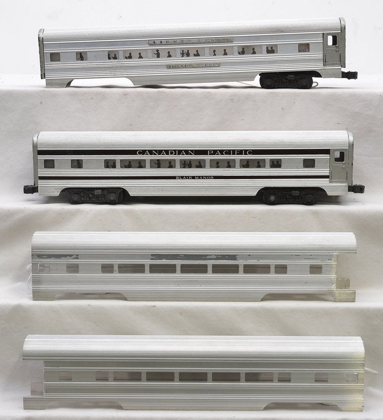 Lionel Postwar 553 CP 2533 2-Aluminum Shells: Lionel postwar aluminum 2553 Canadian Pacific Blair Manor Pullman with incorrect silhouettes marked 2533 on one side and 2534 on the other side. This car has reproduction stripes. Also included is an 