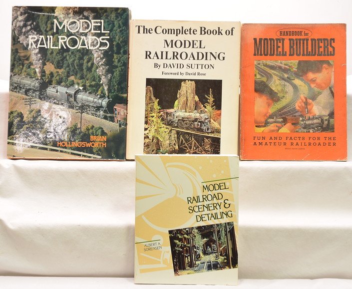 Selection of Rail Road Books: Selection of railroad books including; Model Railroads by Brian Hollingsworth, The Complete Book of Model Railroading by David Sutton, Handbook for Model Builders by The Lionel Corporation and Model R