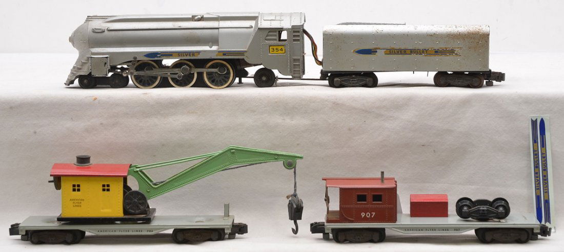 Am Flyer Silver Bullet Freight Set no. K5407T: American Flyer S gauge The Silver Bullet steam freight train set no. K5407T, circa 1954 including; satin silver 354 Silver Bullet streamlined Pacific loco with red glowing smoke and choo-choo and tend