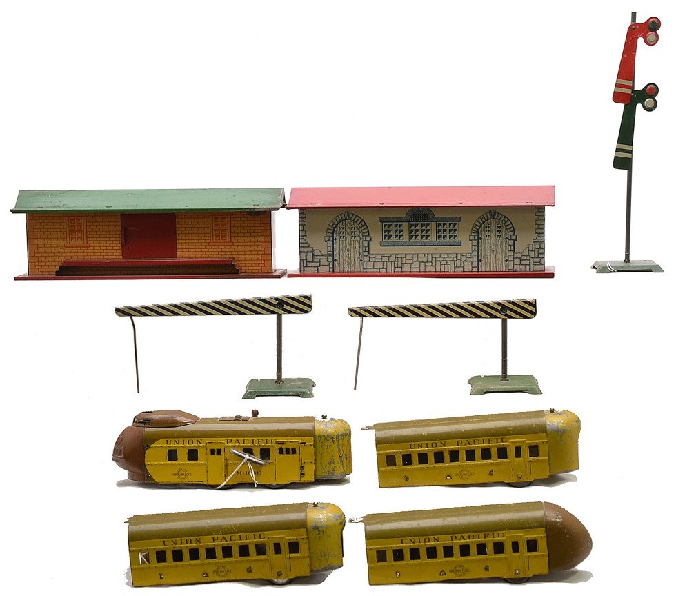 Hafner Stations M10000 UP Streamliner Pass Set: Hafner prewar lithographed accessories; two 123 crossing gates, 124 double arm semaphore, Glen Ellyn station and a freight station with a sliding door. Also included is a Hafner M10000 yellow and brow