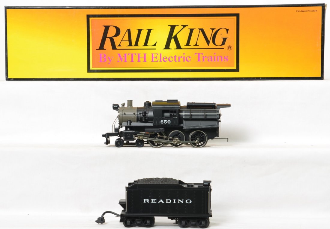 Railking Reading Camelback steam locomotive: MTH Railking modern O gauge 30-1142-0 Reading Camelback steam locomotive in OB. Loco features smoke and whistle and is in C8 condition.