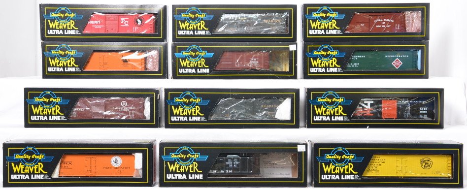 12 Weaver freight cars NYC, Reading, PRR, etc: Weaver modern O gauge freight cars in OBs. Twelve freight cars include New York Central refrigerator car, Cotton Belt refrigerator car, Jersey Central refrigerator car, two Reading express boxcars, Ne