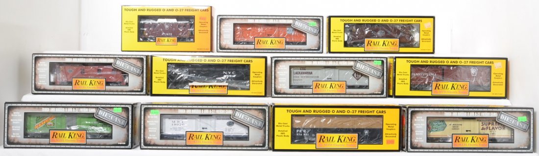 11 Railking freight cars, some die cast PRR, NYC,: MTH Railking modern O gauge freight cars in OBs. Eleven cars include 7730 Pennsylvania caboose, 7418 Pennsylvania boxcar, 7517 New York Central hopper, 7721 New York Central caboose, 7212 Pennsylvania