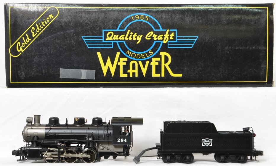 Weaver brass Rock Island 0-6-0 steam locomotive: Weaver modern O gauge Rock Island USRA 0-6-0 steam locomotive in OB. Loco is C7 with detached bell and one detached pickup roller. Both are in OBs. OBs have some wear.