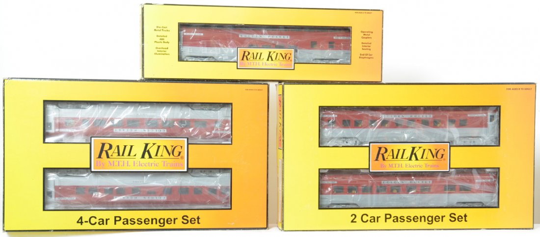 7 Railking Rock Island Golden Rocket passenger cars: MTH Railking modern O gauge Rock Island Golden Rocket passenger cars in OBs. Seven cars include 30-6708 four car set, 6710 sleeper / diner add on, and 6729 vista dome. Cars are C8 with run time. OBs h