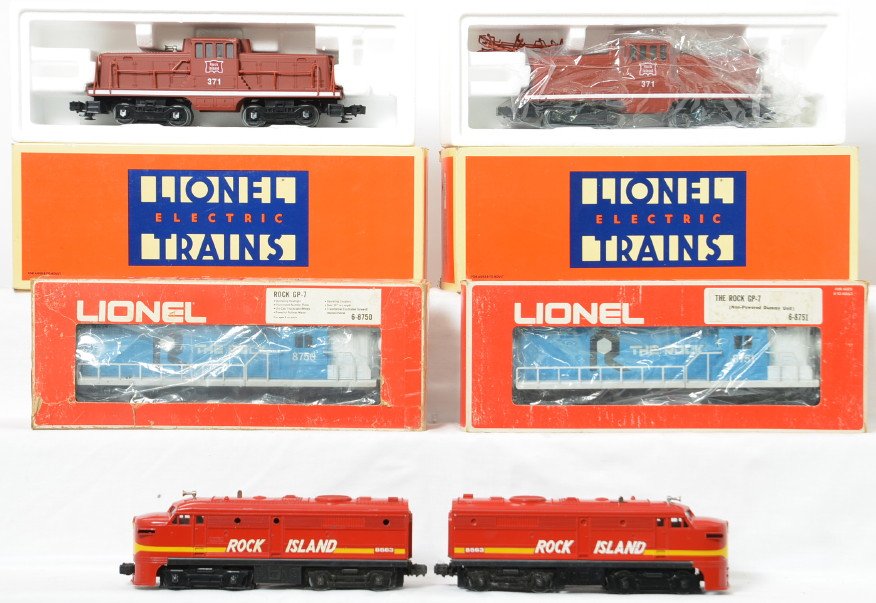 6 Lionel Rock Island locos 8750, 8563, 18907: Lionel modern O gauge Rock Island diesel locomotives. Six locos include two 8563 Alco A units, 8750 and 8751 Rock GP-7 power and dummy locos, and two 18907 44 ton switchers. Locos are C7 to lower C8. 
